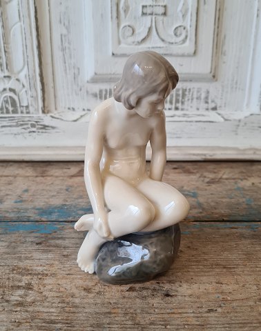 Royal Copenhagen figure - Naked girl on stone no. 4027