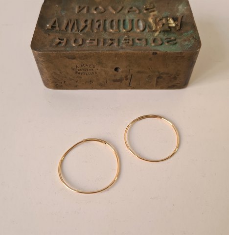 Creoler i 14 kt guld 25 mm.