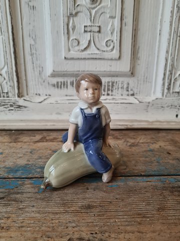 Royal Copenhagen figurine - boy on pumpkin no. 4539