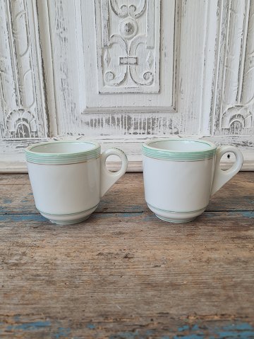 Pair of French café brûlot cups in strong iron porcelain decorated with green stripes