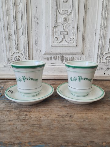 Pair of French café brûlot cups in strong iron porcelain decorated with green stripes and the text Café Prévost