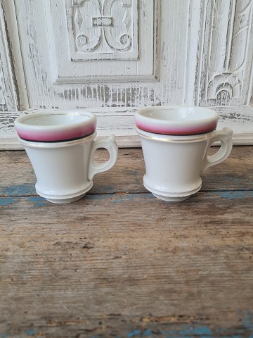 Pair of French café brûlot cups in strong iron porcelain decorated with bright red, black and gold stripes