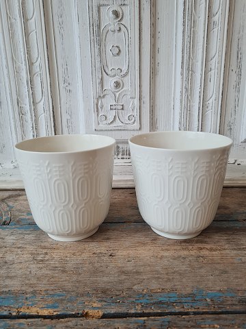 Royal Copenhagen - pair of flower pots in Blanc de Chine decorated with a geometric pattern in relief designed by Thorkild Olsen no. 4133