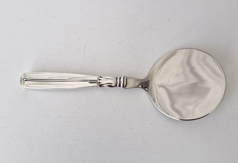 Lotus serving spade in silver and steel