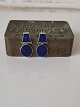 Pair of silver earrings with lapis