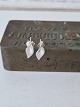 Leaf-shaped earrings in sterling silver